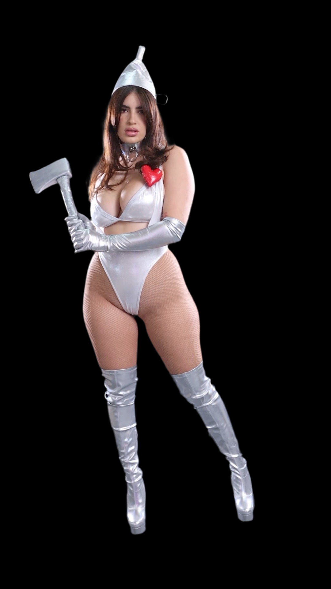 Person in a  tin man costume with an axe on a black background